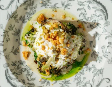 Broccoli with stracciatella, truffle sauce and parmesan biscuits